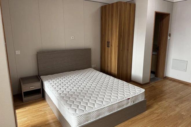 米乐M6:新增400张床位!为城市建设者打造“有温度的家”(图3)